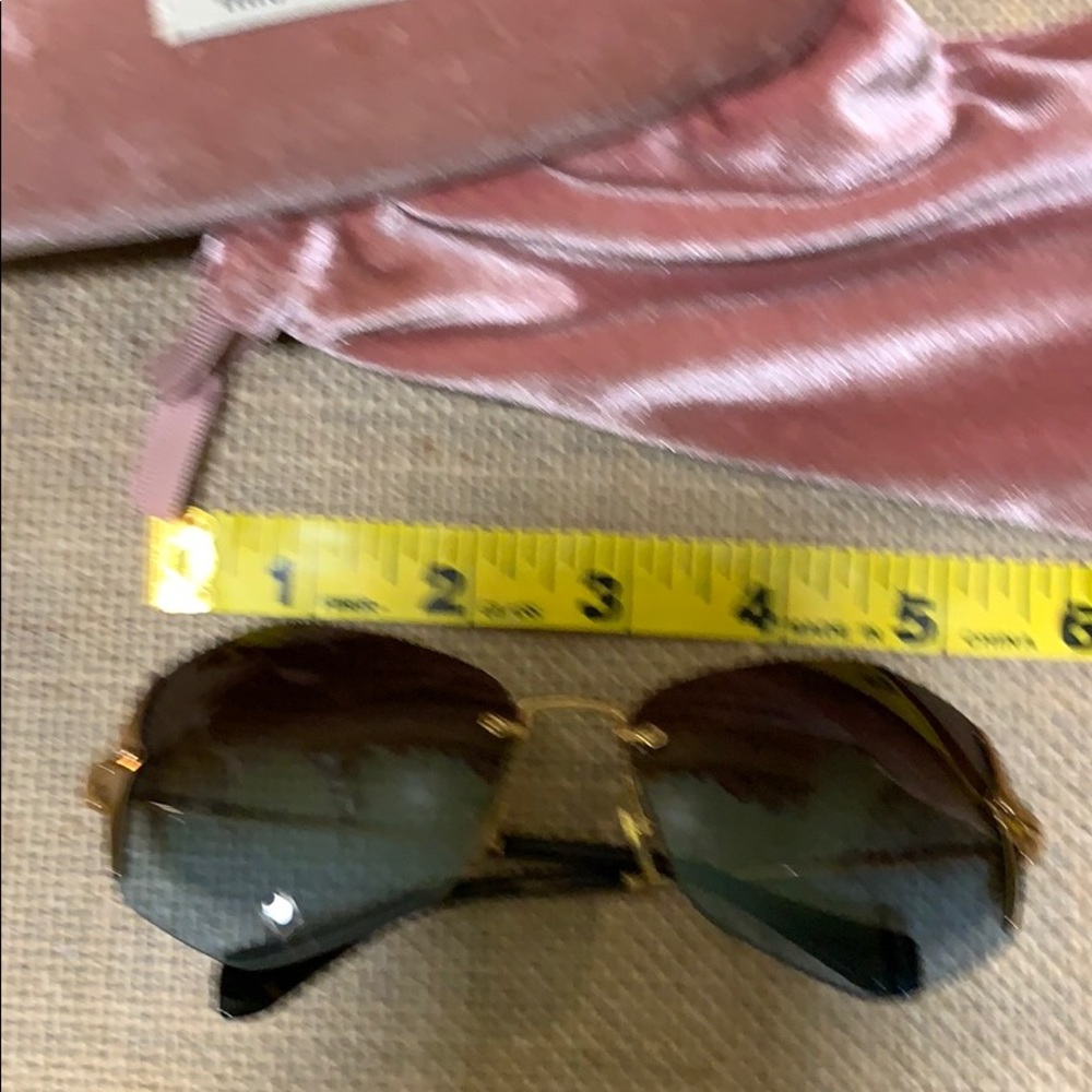 MIU MIU Frameless Super Lightweight Sunglasses - Picture 10 of 10